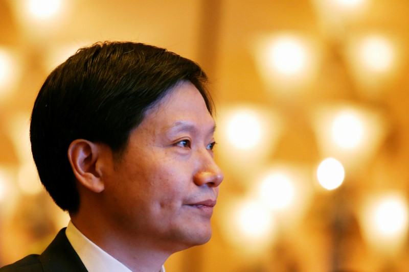 Xiaomi founder Lei Jun attends a news conference in Hong Kong