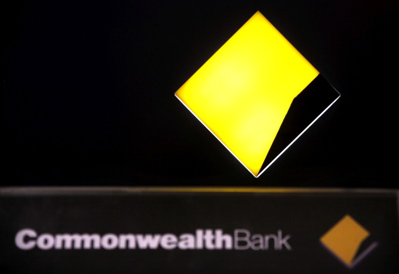 FILE PHOTO: A Commonwealth Bank logo adorns an Automatic Tellar Machine located in Sydney, Australia