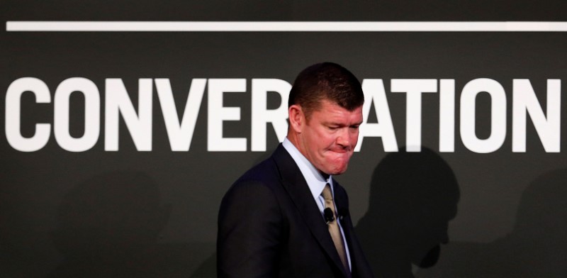 FILE PHOTO: FILE PHOTO: Founder of Australia's Crown Ltd, Packer walks to the stage at an evening business event in Sydney