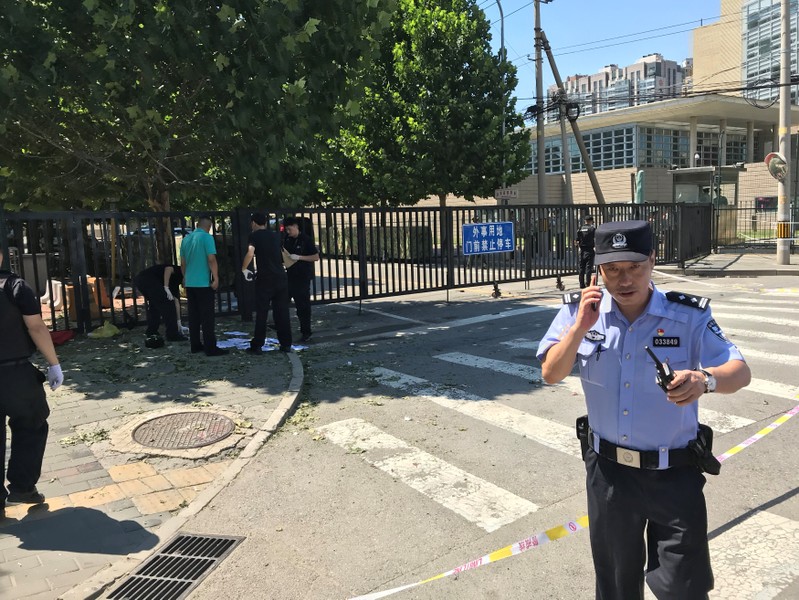 Police officer is seen near the U.S. embassy in Beijing