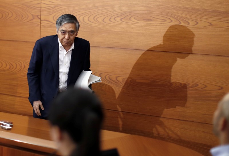 Bank of Japan Governor Haruhiko Kuroda attends a news conference at the BOJ headquarters in Tokyo