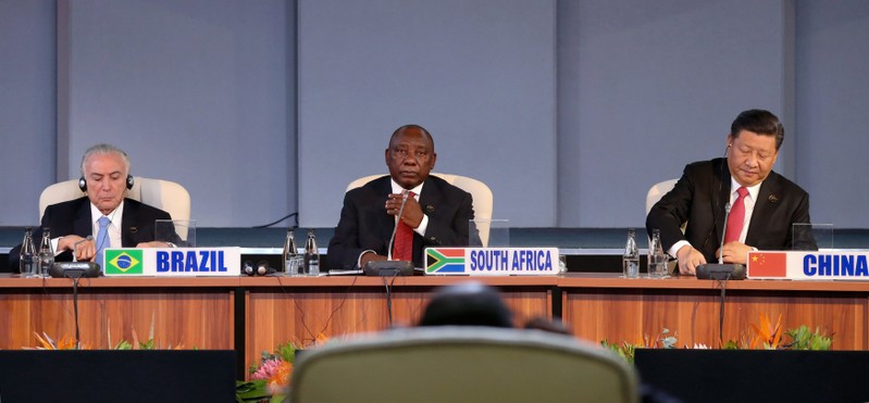 FILE PHOTO: Brazil's President Michel Temer, South Africa's President Cyril Ramaphosa and China's President Xi Jinping attend the BRICS summit meeting in Johannesburg