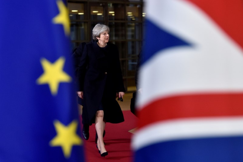 FILE PHOTO: British PM May arrives for the EU summit in Brussels