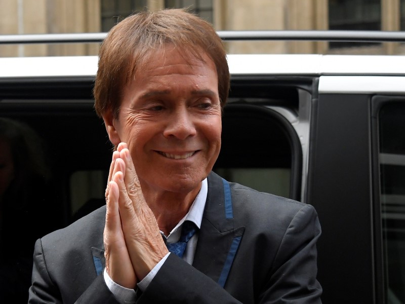 Singer Cliff Richard arrives at the High Court for judgement in the privacy case he brought against the BBC, in central London