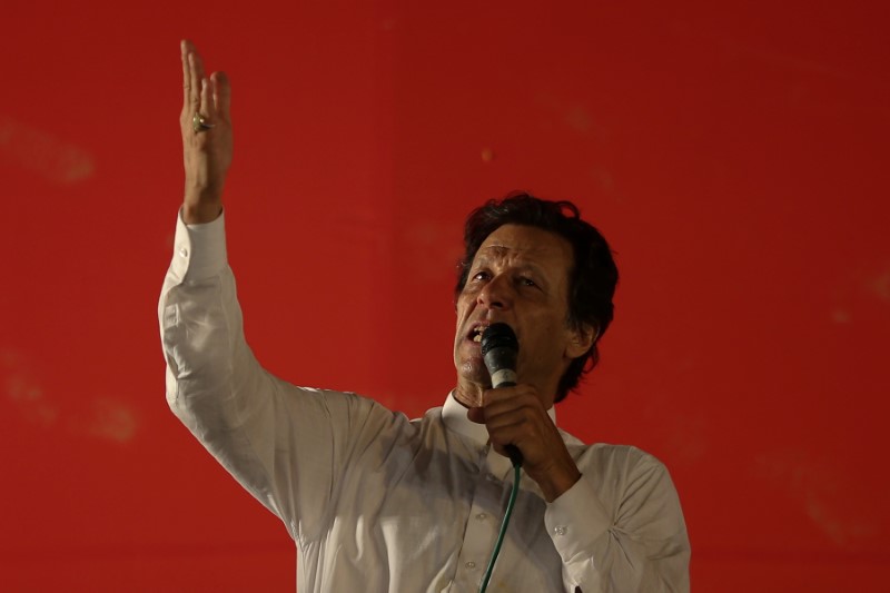 Imran Khan, chairman of the Pakistan Tehreek-e-Insaf (PTI) gestures while addressing his supporters during a campaign meeting ahead of general elections in Islamabad