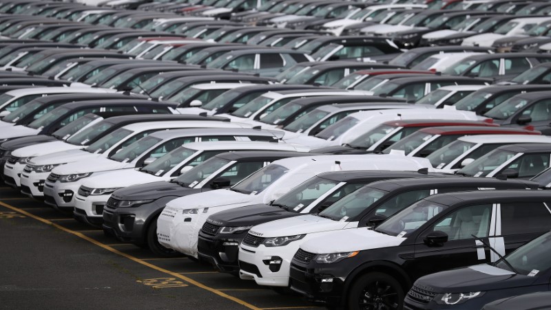 New Land Rover cars are seen in a parking lot at the Jaguar Land Rover plant at Halewood in Liverpool, northern England.