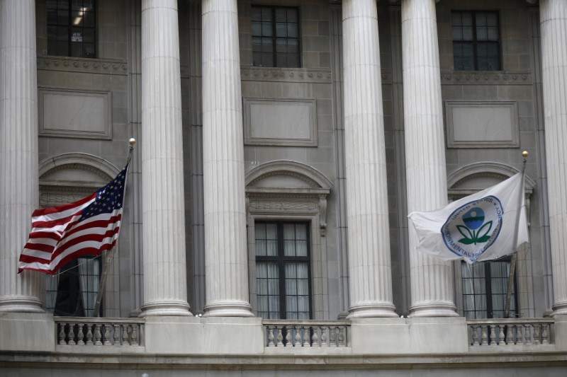 Flags fly outside the EPA headquarters in Washington