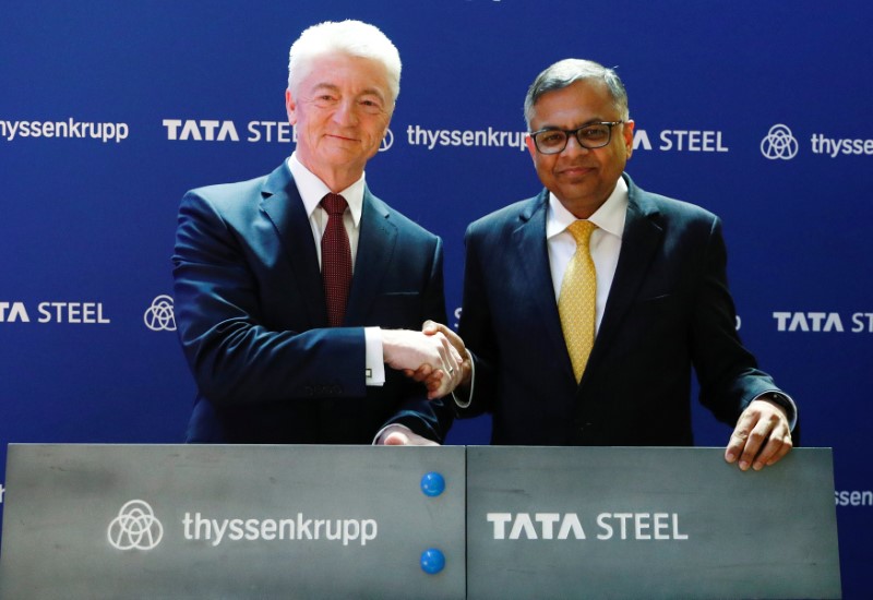 Germany's ThyssenKrupp CEO Hiesinger and Tata Sons Chairman Chandrasekaran pose at a joint news conference in Brussels