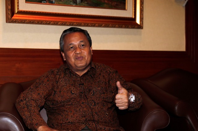 Bank Indonesia's new governor Perry Warjiyo gestures during an interview at Bank Indonesia's headquarters in Jakarta