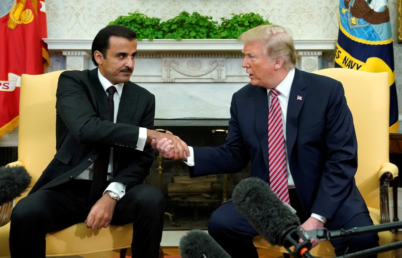 FILE PHOTO: Trump meets Qatar's Emir Sheikh Tamim bin Hamad al-Thani at the White House in Washington