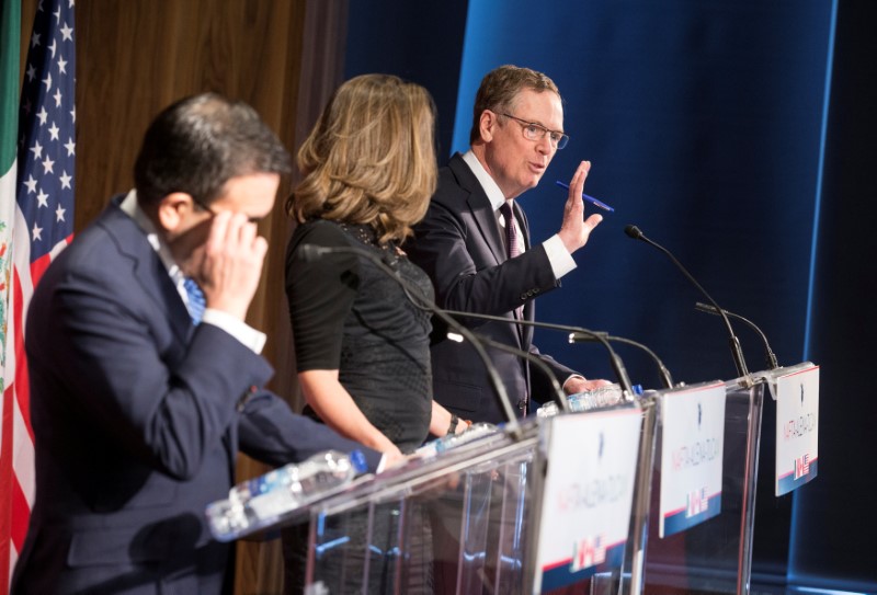 FILE PHOTO: Lighthizer, United States Trade Representative speaks to the press as Freeland, Canada's Minister of Foreign Affairs, and Guajardo, Mexico's Secretary of Economy, look on in Montreal