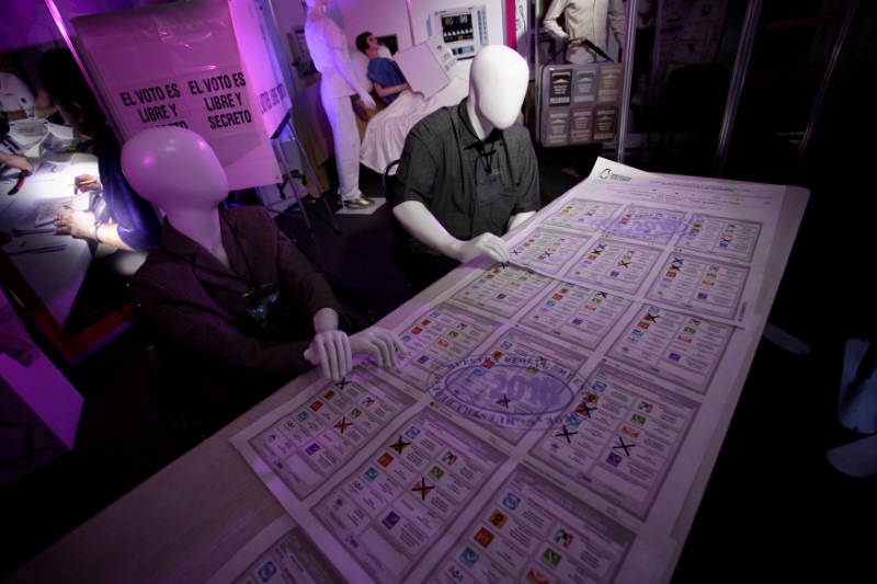 Mannequins are seen in an exhibition inside the INE headquarters ahead of the upcoming July 1 presidential election, in Mexico City