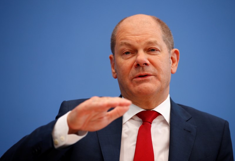 German Vice Chancellor and Finance Minister Olaf Scholz gestures during a news conference to present the fiscal plan for 2019-2022 in Berlin