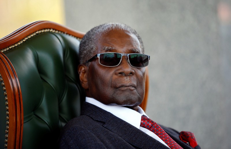Zimbabwe's former president Robert Mugabe looks on during a press conference at his private residence nicknamed 
