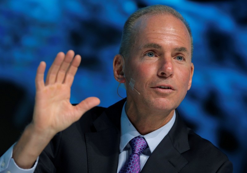 FILE PHOTO: President, Chairman and CEO of The Boeing Company Dennis Muilenburg speaks at the 