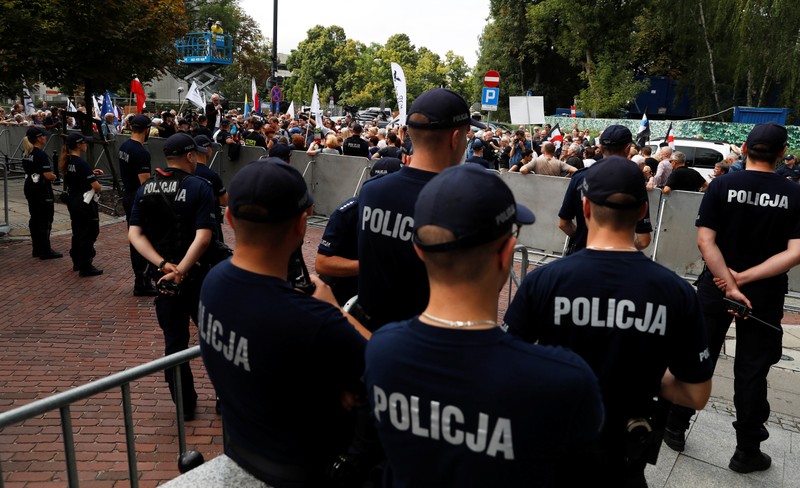 file photo: Police stand guard outside the Parliament building in Warsaw July 18, 2018.