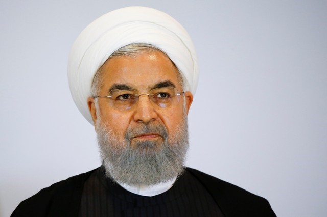 Iranian President Hassan Rouhani delivers a statement after a two day visit in Bern