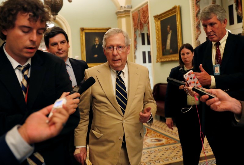 Senate Majority Leader Mitch McConnell speaks with news media at the U.S. Capitol building in Washington