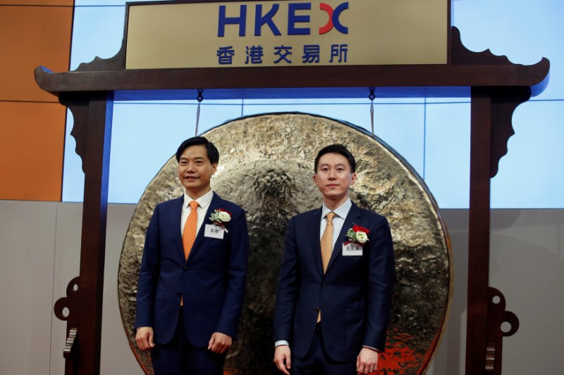 Xiaomi founder Lei Jun and CFO Shou Zi Chew attend listing of the company at Hong Kong Exchanges in Hong Kong