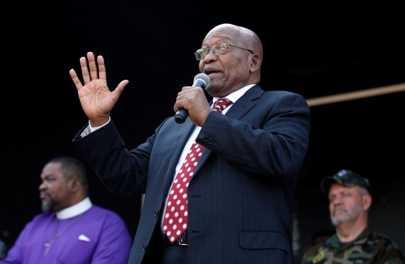 Former South African president Jacob Zuma addresses supporters outside the high court in Durban
