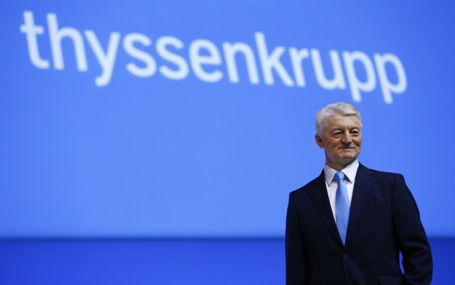 FILE PHOTO: ThyssenKrupp CEO Hiesinger poses on stage before the company's annual shareholders meeting in Bochum