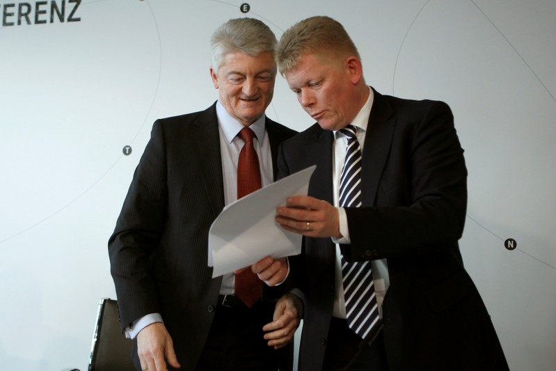 FILE PHOTO: CEO and CFO of Germany's ThyssenKrupp AG talk during the company's annual news conference at the headquarters in Essen