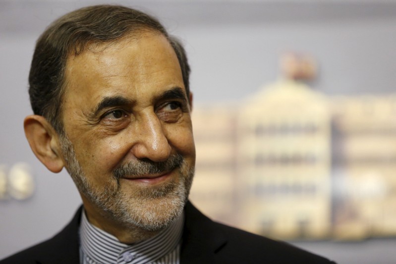 FILE PHOTO: Ali Akbar Velayati smiles as he listens to questions from the media during a news conference in Beirut