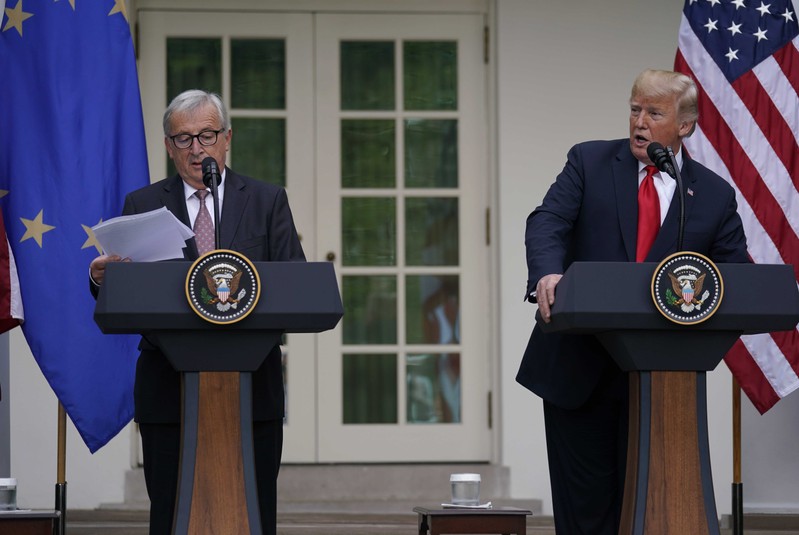 European Commission President Juncker and U.S. President Trump talk to the news media at the White House in Washington