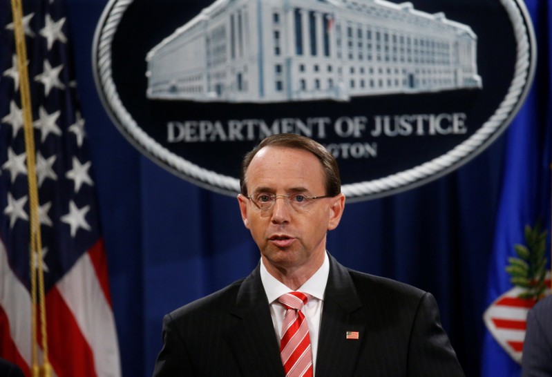 Deputy U.S. Attorney General Rosenstein holds news conference to announce indictments in special counsel Robert Mueller's Russia investigation at the Justice Department in Washington