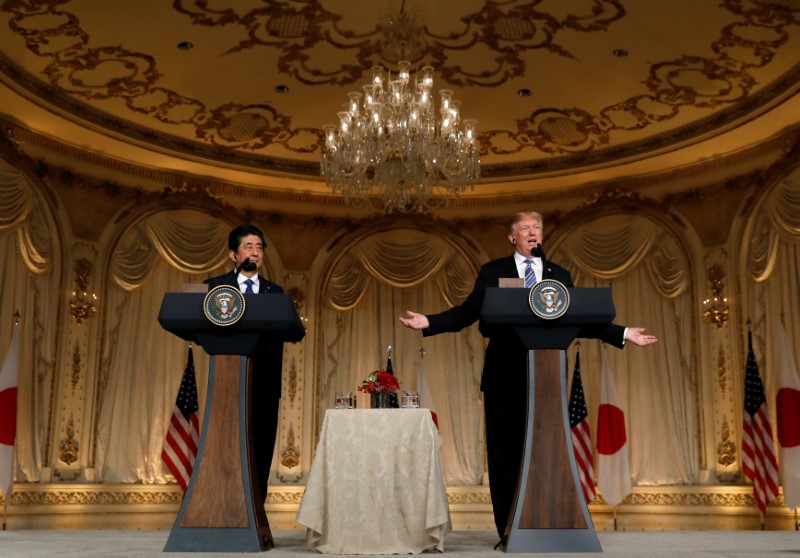 FILE PHOTO: U.S. President Trump speaks as he hosts a joint news conference with Japan's PM Abe in Palm Beach