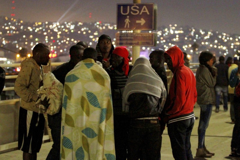Haitians migrants wait to make their way to the U.S. and seek asylum at the San Ysidro Port of Entry in Tijuana, Mexico