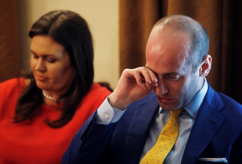 White House Press Secretary Sanders listens with adviser Miller as U.S. President Trump holds cabinet meeting at the White House in Washington