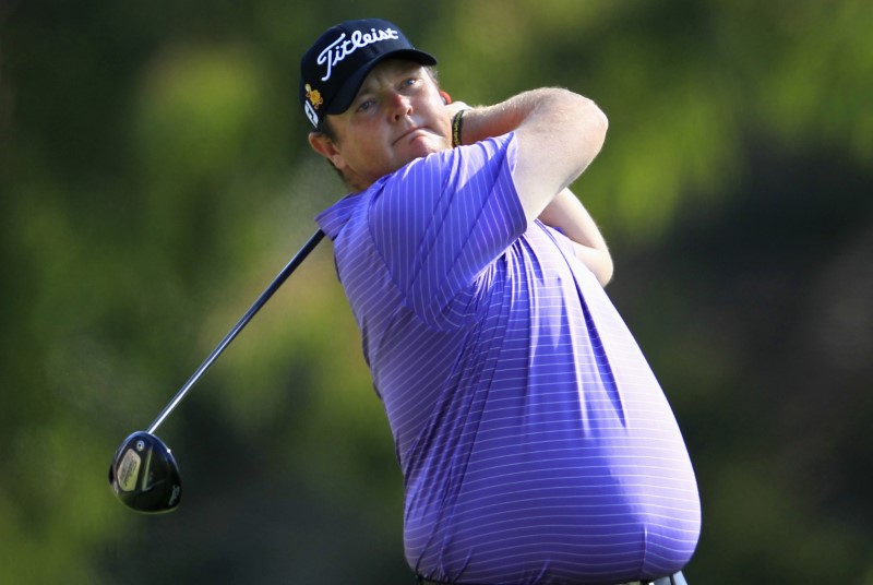 FILE PHOTO: Jarrod Lyle of Australia tees off on the second hole during the final round of the Northern Trust Open golf tournament at Riviera Country Club in Los Angeles