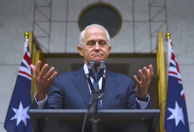 Australian Prime Minister Malcolm Turnbull reacts during a media conference at Parliament House in Canberra