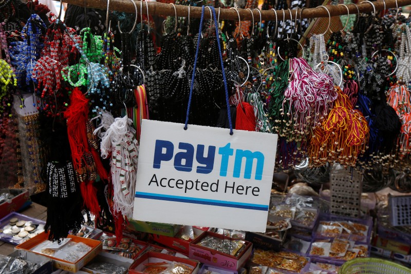 An advertisement of Paytm, a digital wallet company, is pictured at a road side stall in Kolkata
