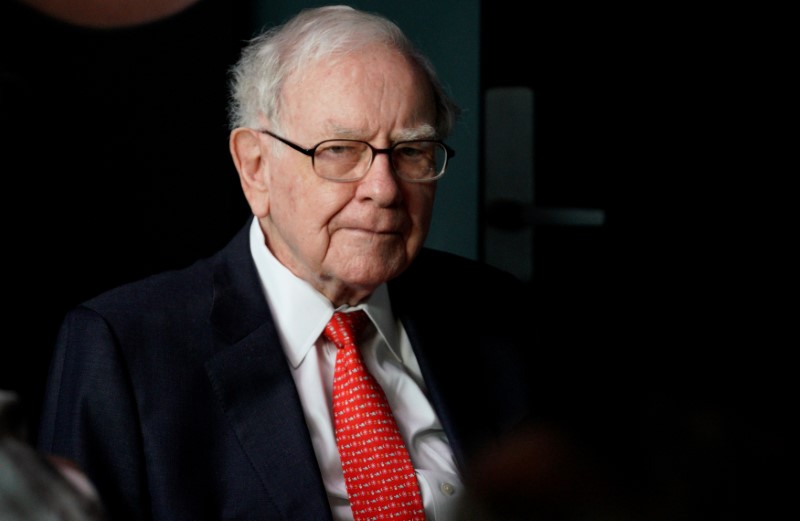 Warren Buffett, CEO of Berkshire Hathaway Inc, pauses while playing bridge as part of the company annual meeting weekend in Omaha