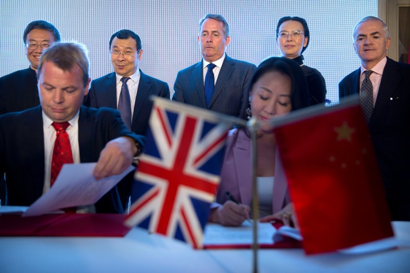 British Secretary of State for International Trade, Fox, attends signing ceremony in Beijing