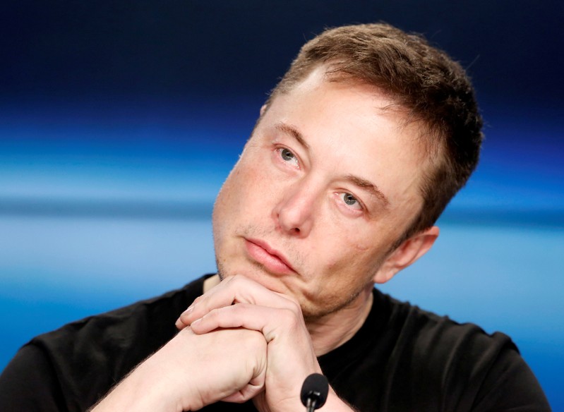 FILE PHOTO: Elon Musk at a press conference following the first launch of a SpaceX Falcon Heavy rocket in Cape Canaveral