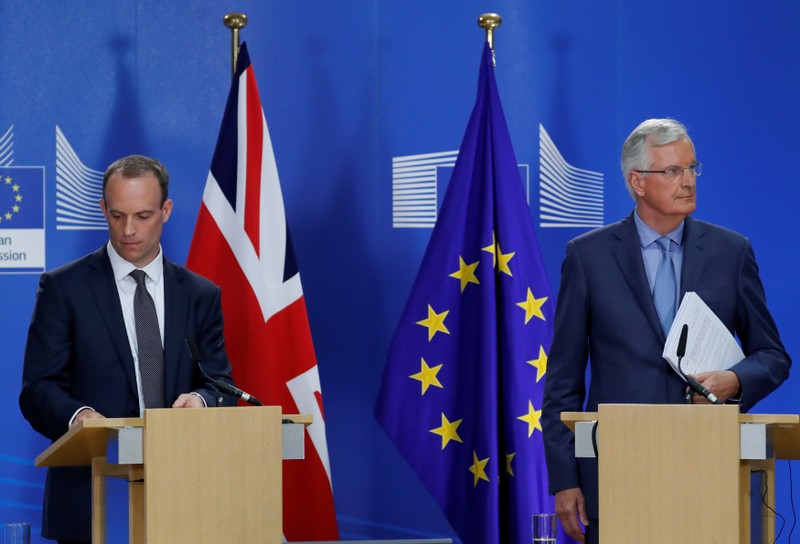 FILE PHOTO: Britain's Secretary of State for Exiting the European Union Dominic Raab and European Union's chief Brexit negotiator Michel Barnier hold a joint news conference in Brussels