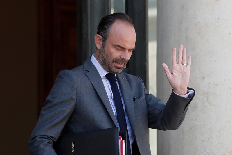 French Prime Minister Edouard Philippe leaves after the weekly cabinet meeting at the Elysee Palace in Paris