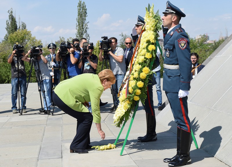 German Chancellor Angela Merkel attends a wreath-laying ceremony at the Tsitsernakaberd Armenian Genocide Memorial in Yerevan