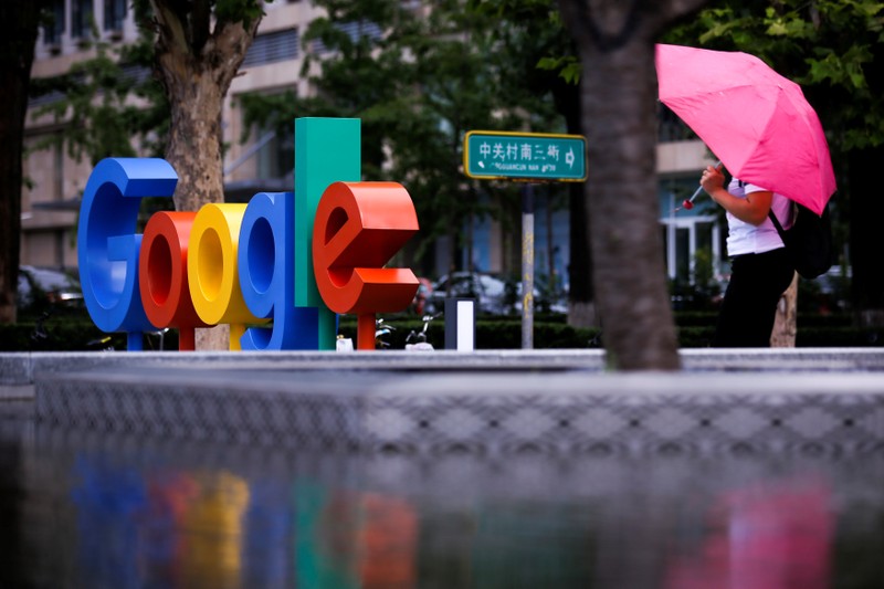 The brand logo of Alphabet Inc's Google is seen outside its office in Beijing