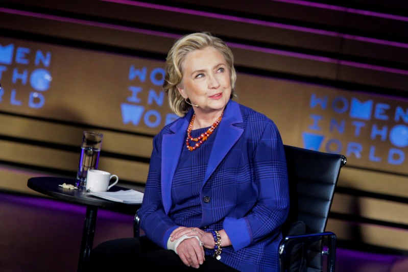 FILE PHOTO: Clinton, Former U.S. Secretary of State listens to Journalist Brown during the Women In The World Summit in New York