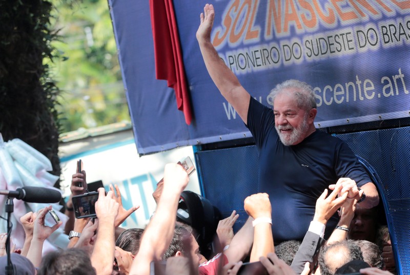 FILE PHOTO: Former Brazilian President Luiz Inacio Lula da Silva is carried by supporters in front of the metallurgic trade union in Sao Bernardo do Campo