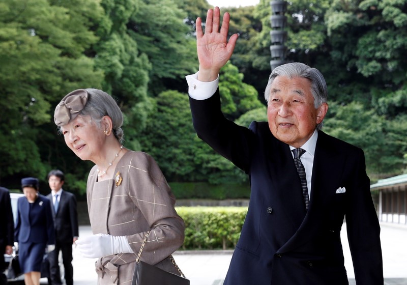 FILE PHOTO: Japan's Emperor Akihito (R) and Empress Michiko arrive at the Imperial Palace before welcoming Vietnam's President Tran Dai Quang and his wife Nguyen Thi Hien in Tokyo