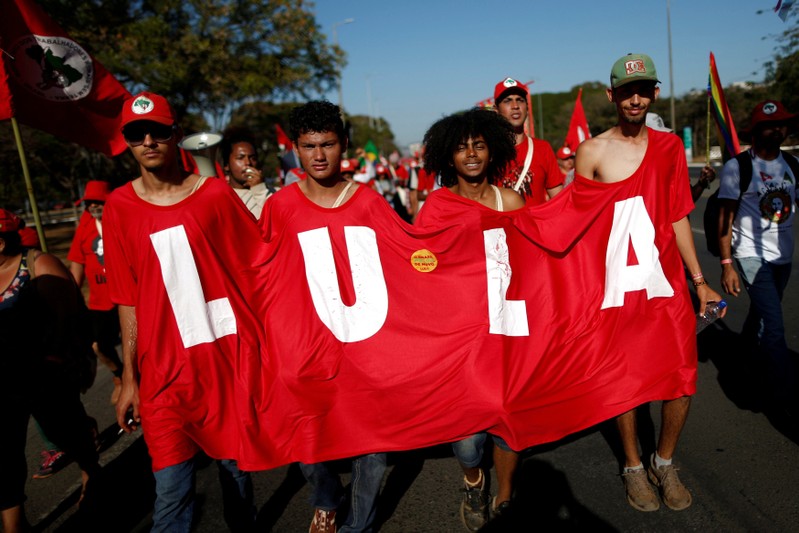 FILE PHOTO: Thousands of Brazil's former President Lula da Silva's supporters walk during the Free Lula March in Brasilia