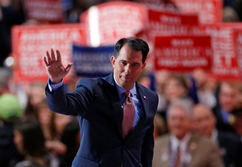 FILE PHOTO: Wisconsin Governor Walker waves after speaking during the third day of the Republican National Convention in Cleveland