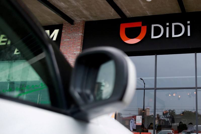 FILE PHOTO: The logo of Chinese ride-hailing firm Didi Chuxing is seen at their new drivers center in Toluca