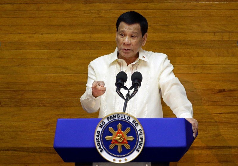 FILE PHOTO: Philippines' Duterte delivers his State of the Nation address at the House of Representatives in Quezon city, Metro Manila