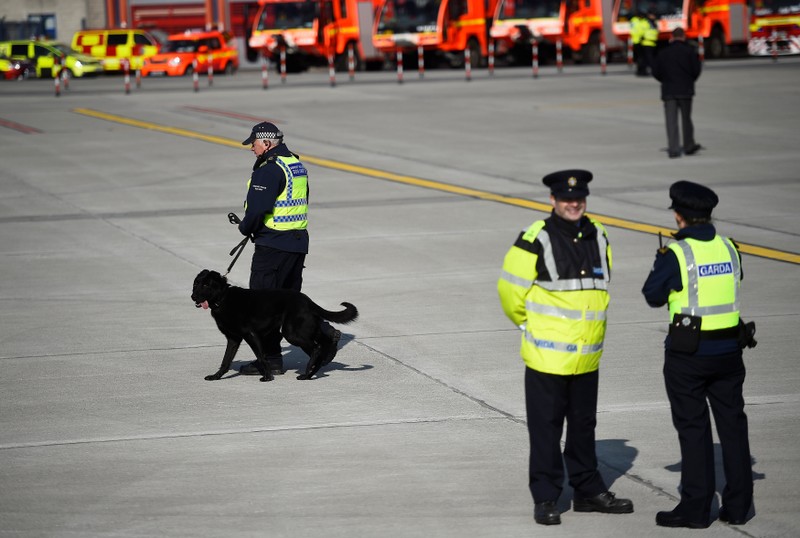 Officers from Ireland's Garda (Police) are seen ahead of the arrival of Pope Francis at Dublin International Airport